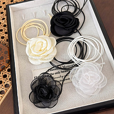 Black rose flower necklace for girls, elegant and delicate design.